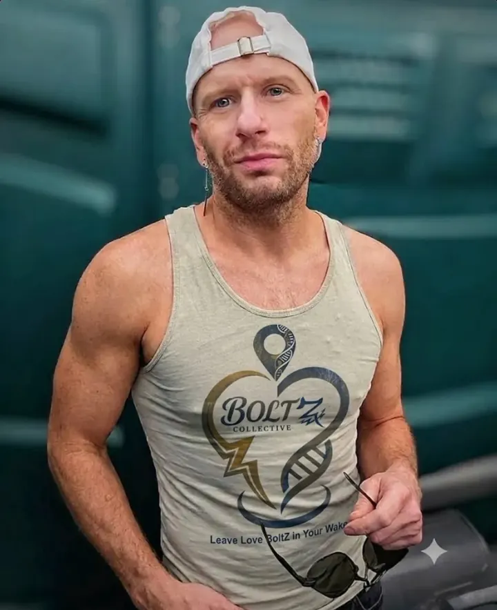 Tony JaXon BoltZ in a BoltZ Collective tank top